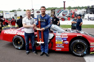 J.R. Fitzpatrick accepts the hardware for winning the Ron MacGillivray 150 (photo - Ken MacIsaac)
