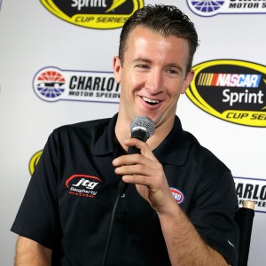A.J. Allmendinger speak sto media (photo - NASCAR via Getty Images)