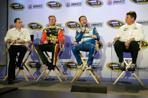 Rob Kauffman, left, drivers Clint Bowyer and Brian Vickers and team owner Michael Waltrip, right (photo - NASCAR via Getty Images)