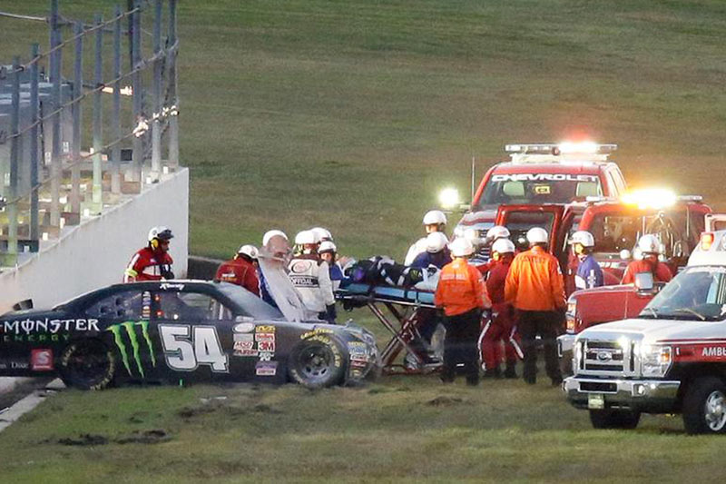 Kyle Busch on a stretcher as emergency crews prepare to transport him to hospital (via Twitter)