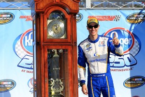 Joey Logano with the traditional Martinsville winners grandfather clock (photo - Daniel Shirey/Getty Images for NASCAR)
