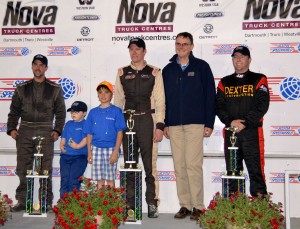 Podium finishers (left to right): Russell Smith, Jr.  - 3rd, Cassius Clark - 1st, Shawn Turple (2nd).