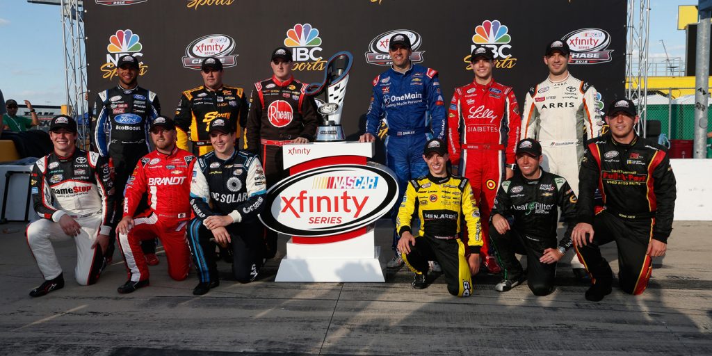 (Back Row L-R)Darrell Wallace Jr, driver of the #6 TMNT Shredder Ford, Brendan Gaughan, driver of the #62 American Ethanol/Thorntons Chevrolet, Ty Dillon, driver of the #3 Rheem Chevrolet, Elliott Sadler, driver of the #1 OneMain Chevrolet, Ryan Reed, driver of the #16 Lilly Diabetes/American Diabetes Association Ford, Daniel Suarez, driver of the #19 ARRIS/TMNT Michelangelo Toyota, (Front Row L-R)Erik Jones, driver of the #20 Hisense Toyota, Justin Allgaier, driver of the #7 LetsTalkFood.com Chevrolet, Brennan Poole, driver of the #48 DC Solar Chevrolet, Brandon Jones, driver of the #33 Tide/Menards Chevrolet, Blake Koch, driver of the #11 LeafFilter Gutter Protection Chevrolet, and Ryan Sieg, driver of the #39 RSS Racing Chevrolet, pose with the NASCAR XFINITY Series trophy after the NASCAR XFINITY Series Drive for Safety 300 at Chicagoland Speedway on September 17, 2016 in Joliet, Illinois (photo - NASCAR via Getty Images)